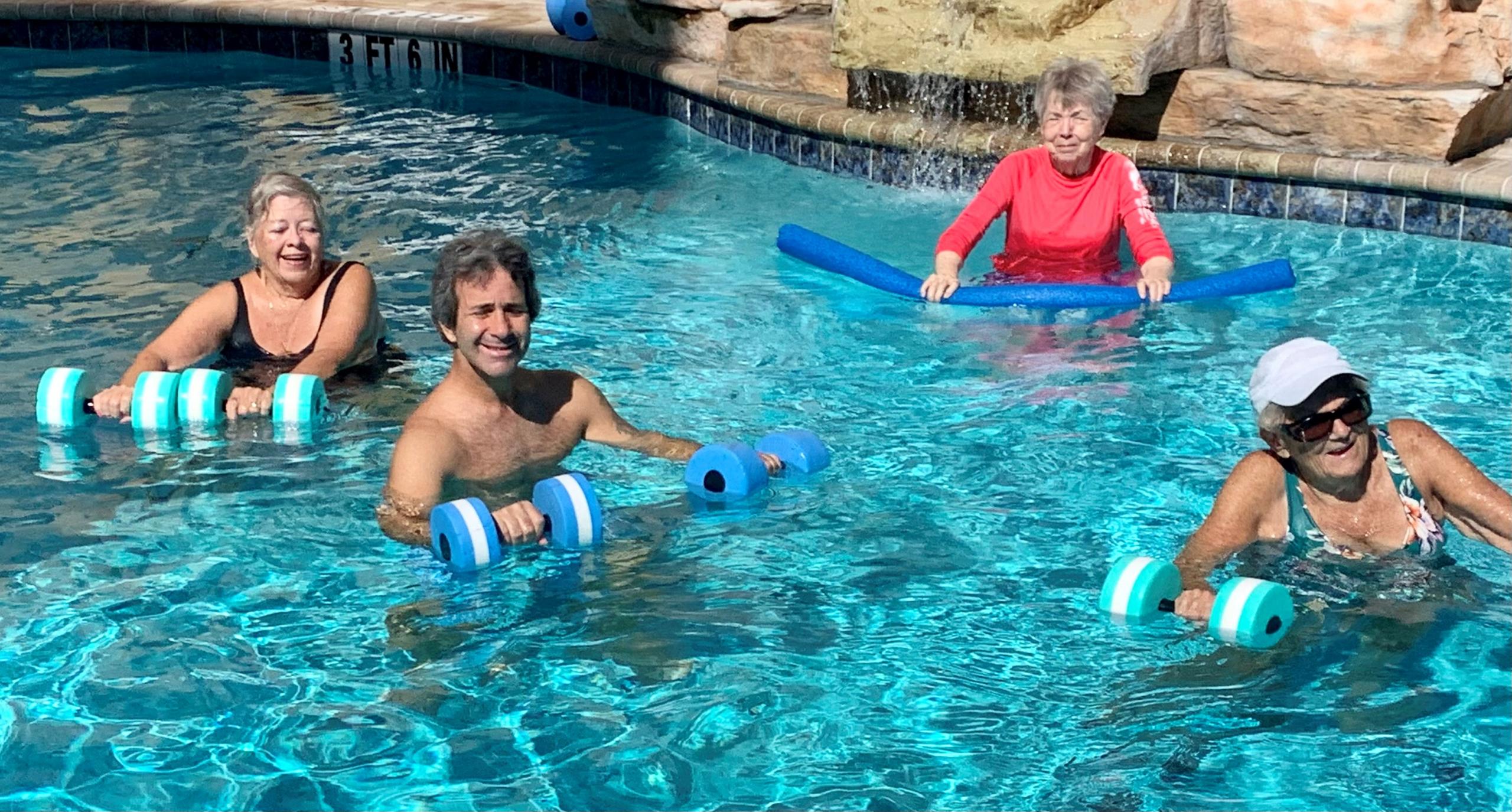 Assisted Living Residents enjoying the pool at Aravilla Sarasota