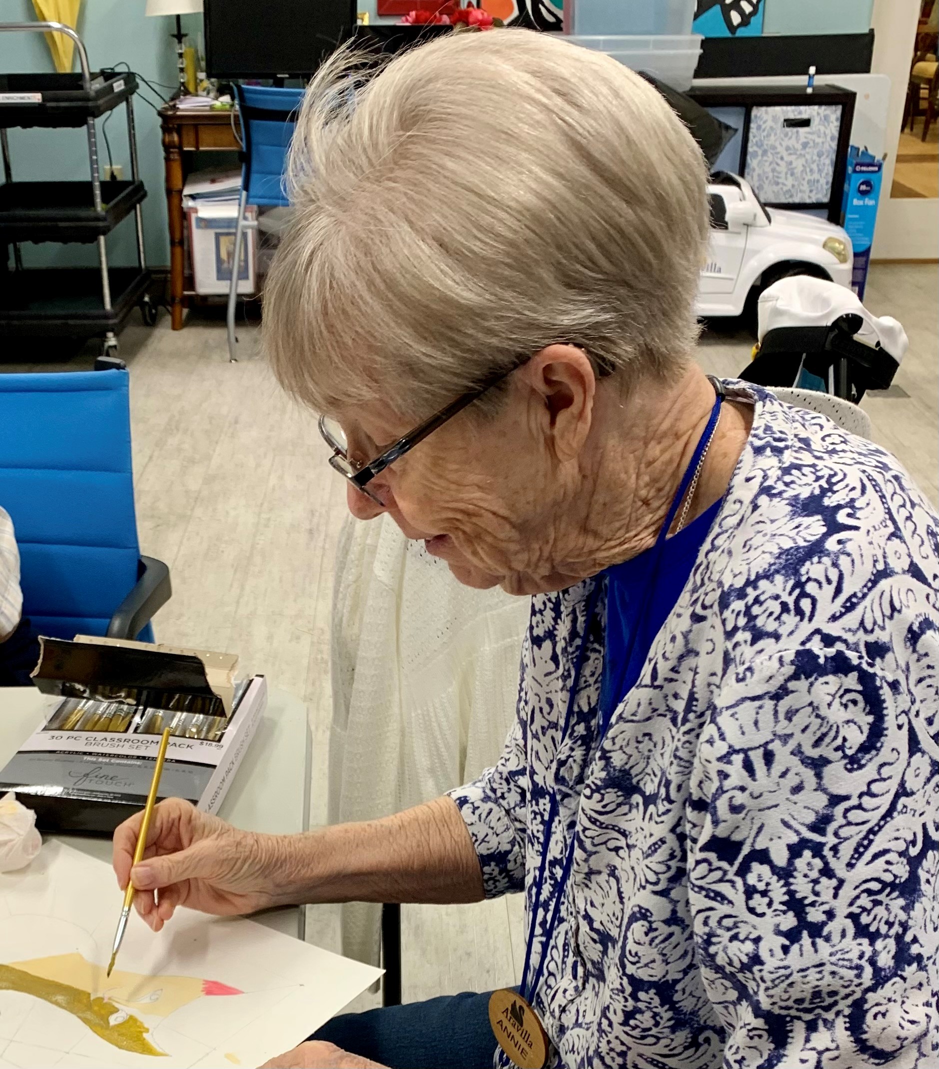 assisted living activities for seniors - Annie is studying watercolors