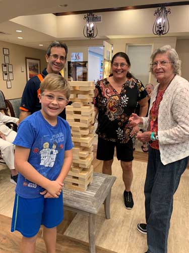 assisted living activity playing Jenga