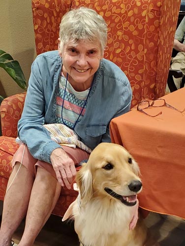 assisted living resident with therapy dog