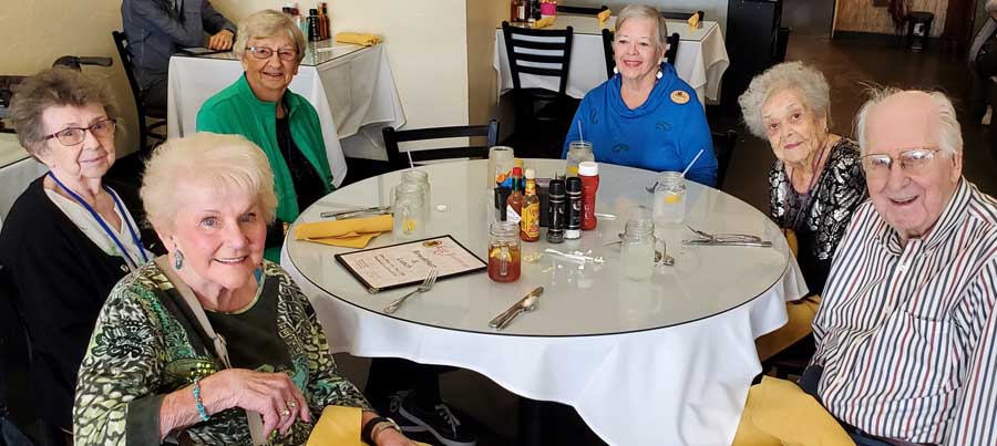 assisted living residents enjoying lunch