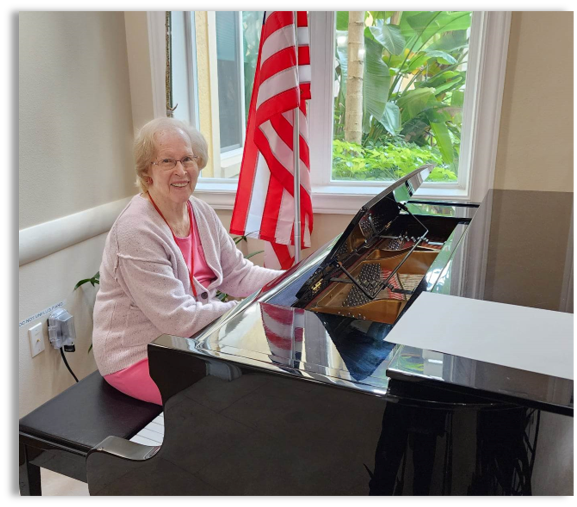 memory care resident playing piano