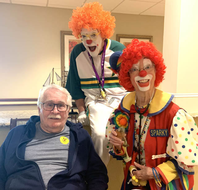 assisted living resident Robert with clowns