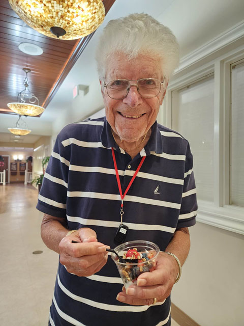memory care resident eating parfait