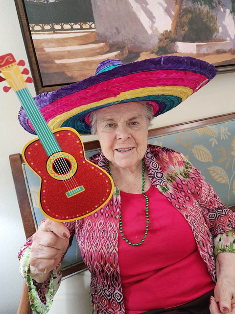 memory care resident wearing a sombrero