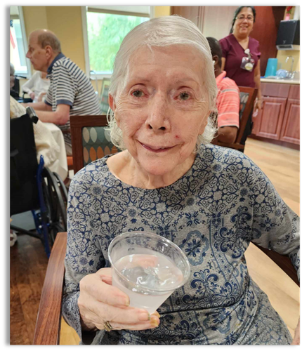 memory care resident drinking water