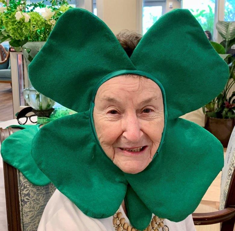 assisted living resident Betty wearing clover leaf