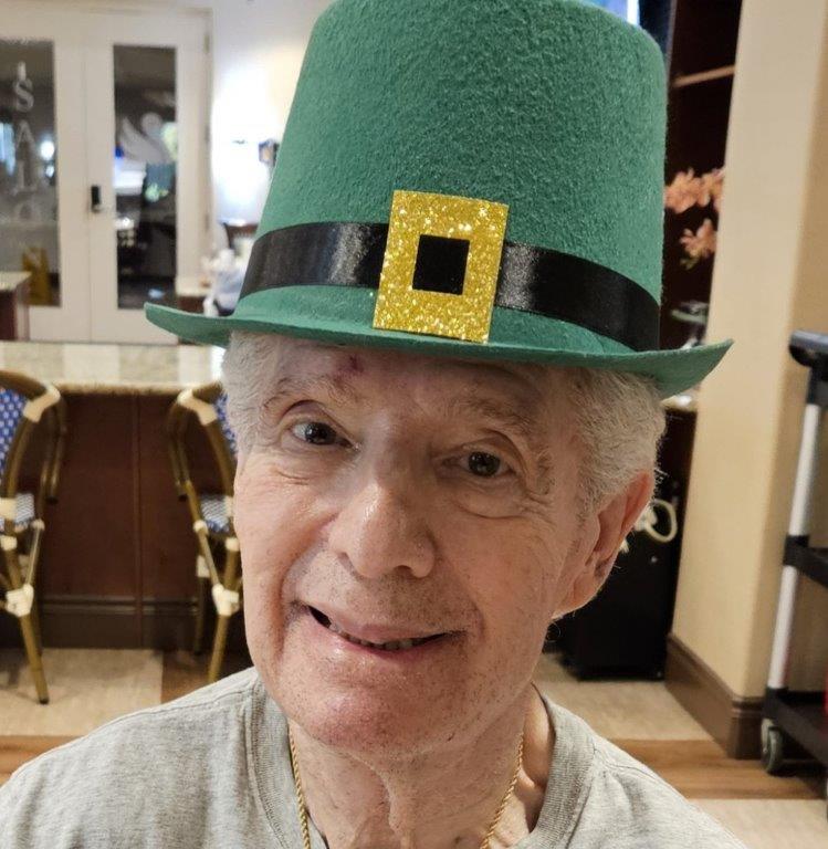 assisted living resident VIC with hat
