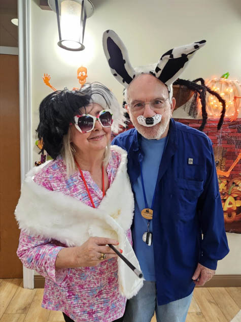 memory care residents having fun with costumes