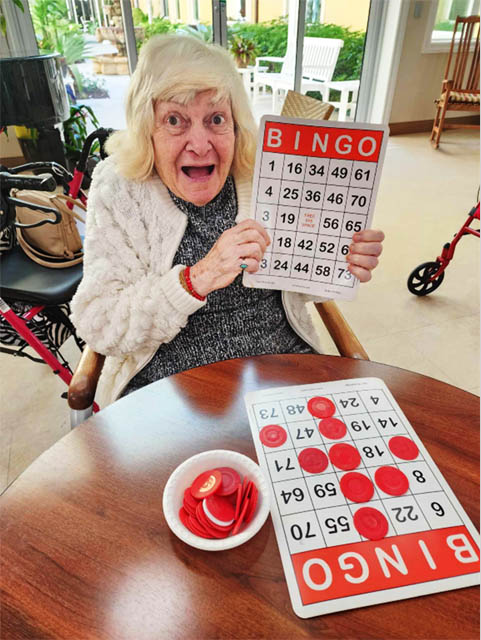 bingo winner at Memory Care Aravilla Sarasota