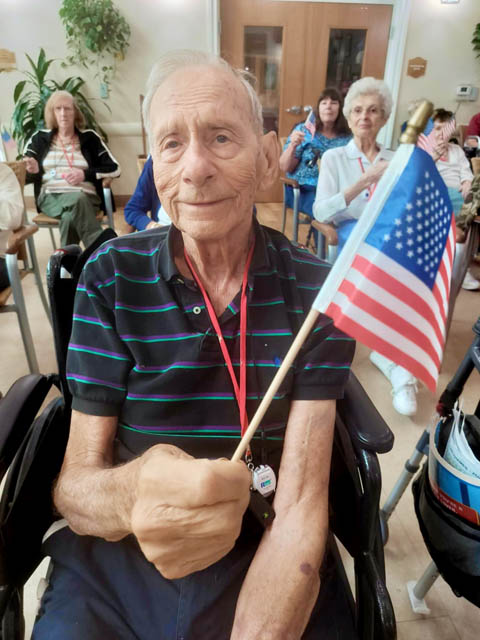 memory care residents celebrating Memorial Day 2 memory care residents celebrating Memorial Day 2