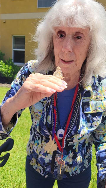butterfly on resident's hand