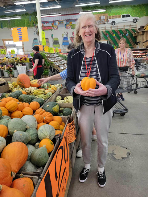 memory care resident with pumpkin memory care resident with pumpkin