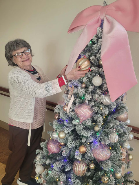 decorating the Christmas tree at Aravilla Sarasota