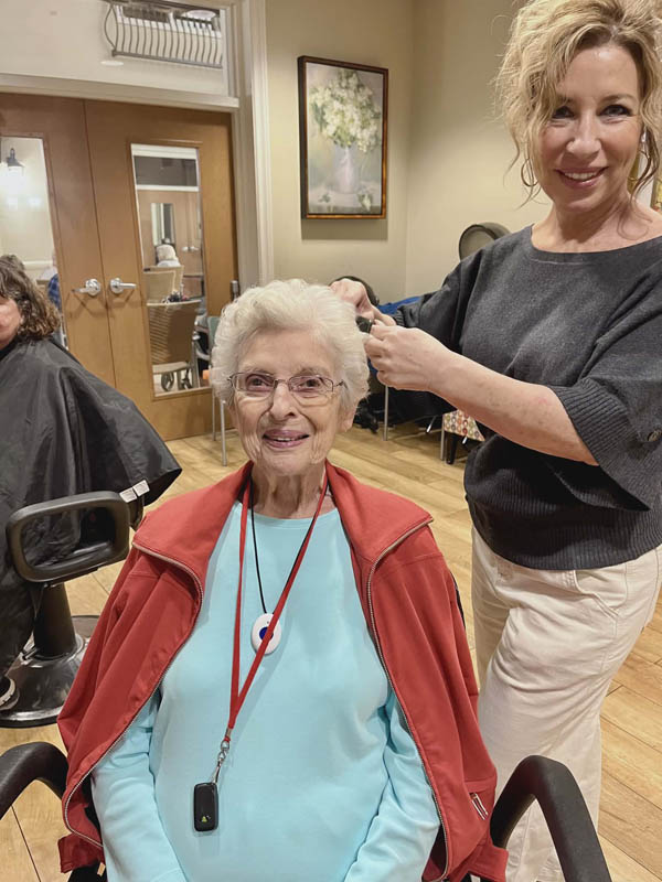 memeory care resident at onsite hair salon