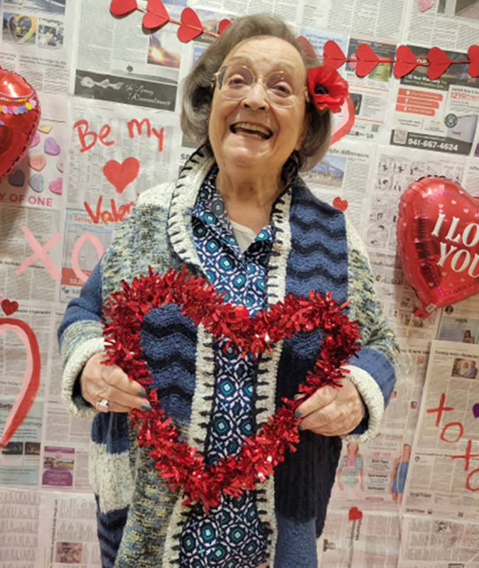 smiling senior at Vatlentines event