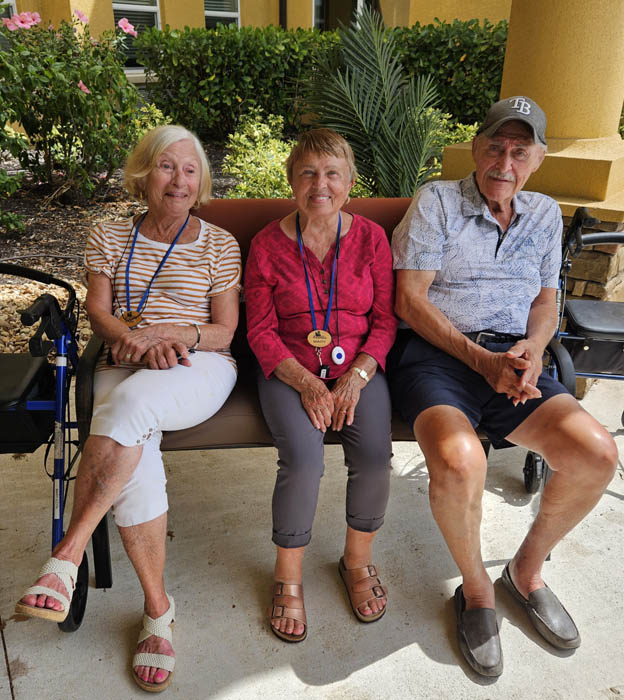 assisted living residents enjoying the courtyard