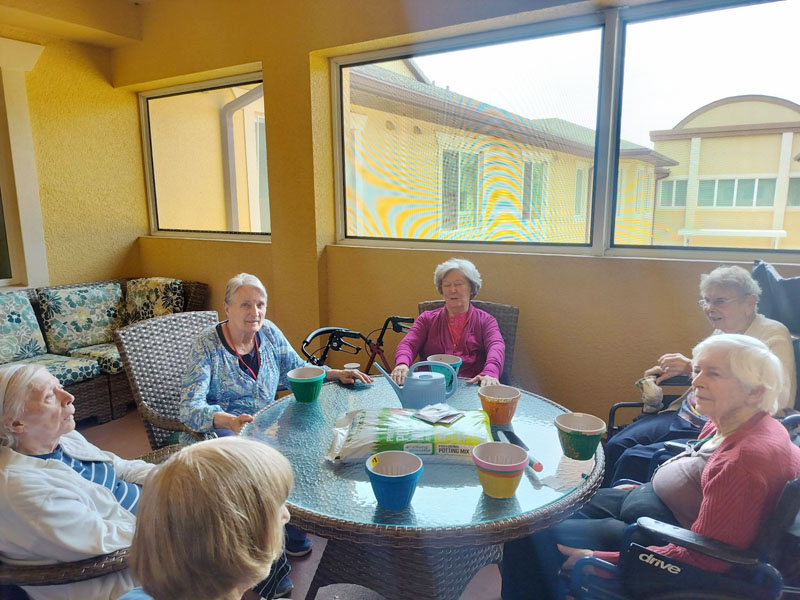 flowerpot project at Memory Care Aravilla Sarasota