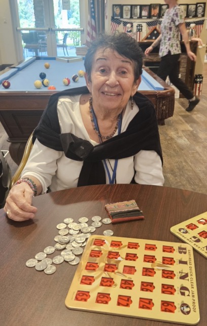 Janet playing bingo Janet playin bingo at Aravilla Sarasota