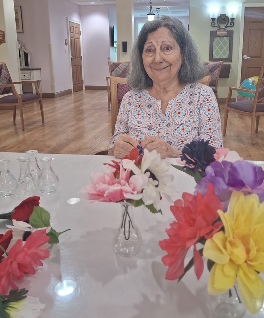 flower arranging in memory care flower arranging - fun activity at Aravilla Sarasota