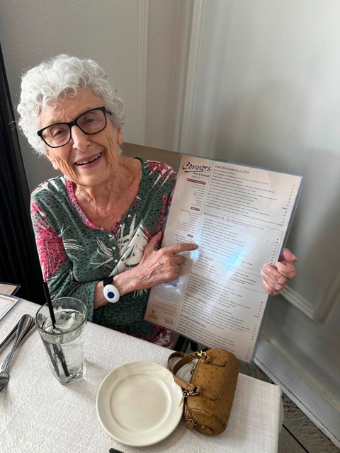 assisted living resident excited at lunch outing assisted living resident excited at lunch outing