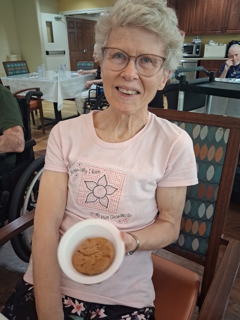 senior resident baking cookies